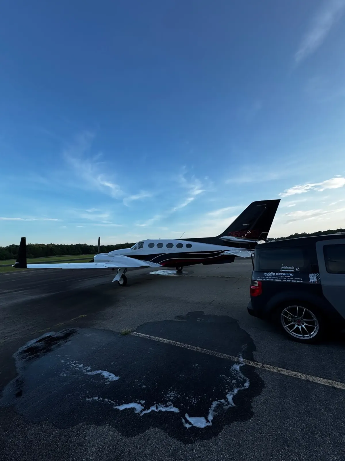 MV Car Detail van next to a freshly detailed aircraft